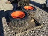 (4) NEW 10-16.5 SKID STEER TIRES AND RIMS (BOBCAT) - ALL ONE PRICE