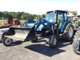 TL100 NEW HOLLAND TRACTOR W/ CAB AND LOADER