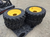 (4) NEW 10-16.5 JD/NH/CAT SKID STEER TIRES AND RIMS - ALL ONE PRICE