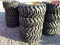 (4) NEW 12-16.5 SKID STEER TIRES AND RIMS (YELLOW) - ALL ONE PRICE