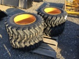 (4) NEW 12-16.5 SKID STEER TIRES AND RIMS (CASE) - ALL ONE PRICE