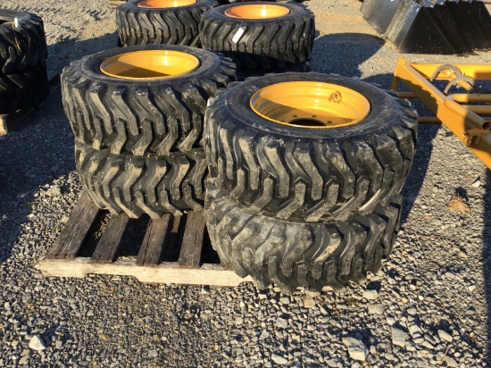 (4) NEW 12-16.5 SKID STEER TIRES AND RIMS - ALL ONE PRICE