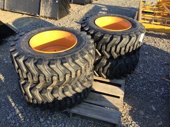 (4) NEW 12-16.5 SKID STEER TIRES AND RIMS - ALL ONE PRICE