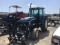 7840 FORD TRACTOR W/ CAB AND LOADER
