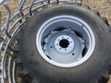 (2) NEW 16.9/28 TITAN TRACTOR TIRES AND RIMS - BOTH ONE PRICE