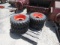 (4) NEW ORANGE 10-16.5 SKID STEER TIRES AND RIMS - ALL ONE PRICE