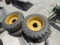 (4) NEW 10-16.5 YELLOW SKID STEER TIRES AND RIMS - ALL ONE PRICE