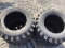 (4) NEW 12-16.5 SKID STEER TIRES - ALL ONE PRICE