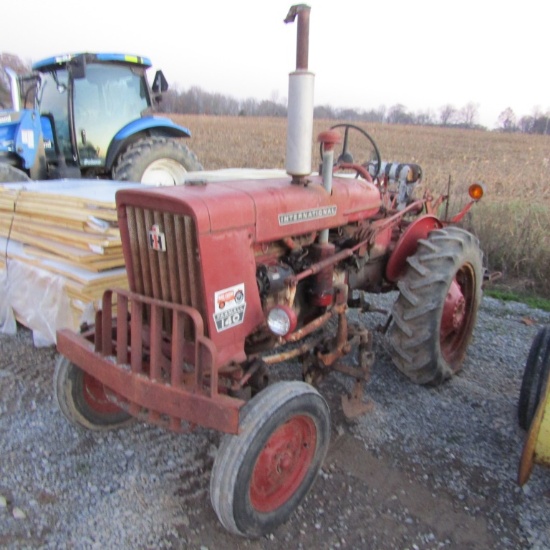 140 FARMALL TRACTOR W/ CULTIVATORS AND SIDE DRESSER