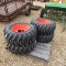 (4) NEW 12-16.5 SKID STEER TIRES AND RIMS (ORANGE)