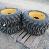 (4) NEW 12-16.5 SKID STEER TIRES ON YELLOW RIMS - ALL ONE PRICE
