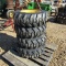 (4) NEW 10-16.5 SKID STEER TIRES AND RIMS (YELLOW) - ALL ONE PRICE