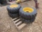 (4) NEW 10-16.5 SKID STEER TIRES ON YELLOW RIMS - ALL ONE PRICE