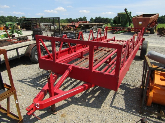 RED HAY FEEDER TRAILER