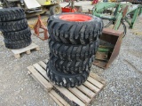(4) NEW 10-16.5 SKID STEER TIRES ON ORANGE RIMS - ALL ONE PRICE