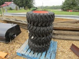 (4) NEW 12-16.5 ORANGE SKID STEER TIRES AND RIMS - ALL ONE PRICE