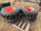 (4) NEW 12-16.5 ORANGE SKID STEER TIRES AND RIMS - ALL ONE PRICE