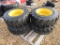 (4) NEW 12-16.5 YELLOW SKID STEER TIRES AND RIMS - ALL ONE PRICE
