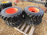 (4) NEW 12-16.5 ORANGE SKID STEER TIRES AND RIMS - ALL ONE PRICE