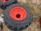 (4) NEW 12-16.5 ORANGE SKID STEER TIRES AND RIMS - ALL ONE PRICE