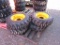 (4) NEW 10-16.5 YELLOW SKID STEER TIRES AND RIMS - ALL ONE PRICE