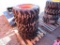 (4) NEW 10-16.5 ORANGE SKID STEER TIRES AND RIMS - ALL ONE PRICE