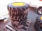 (4) NEW 10-16.5 YELLOW SKID STEER TIRES AND RIMS - ALL ONE PRICE