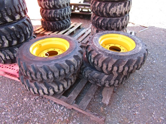 (4) NEW 10-16.5 YELLOW SKID STEER TIRES AND RIMS - ALL ONE PRICE