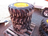 (4) NEW 10-16.5 YELLOW SKID STEER TIRES AND RIMS - ALL ONE PRICE