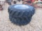 (2) NEW 16.9/28 TITAN TRACTOR TIRES AND RIMS