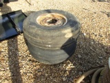 (2) 10-16 8 LUG IMPLEMENT TIRES AND RIMS