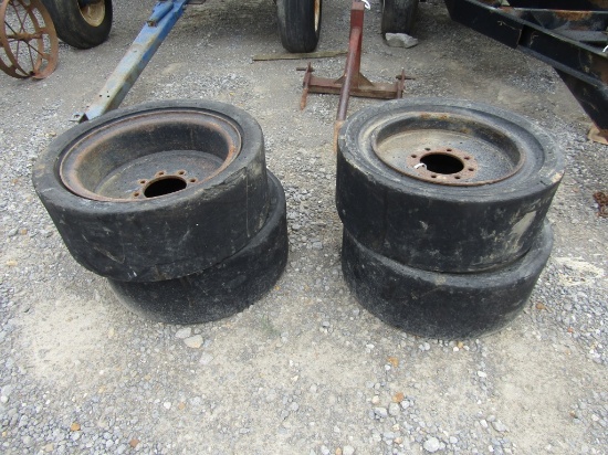 (4) Solid Skid Steer Tires