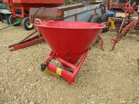RED FERTILIZE SPREADER