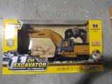 NEW HUINA 1/16TH REMOTE CONTROLLED EXCAVATOR W/ BLADE