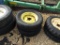 (2) 4 LUG IMPLEMENT TIRES AND RIMS - BOTH ONE PRICE