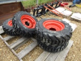 (4) NEW 10-16.5 ORANGE SKID STEER TIRES AND RIMS - ALL ONE PRICE
