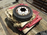 225/70R19.5 TIRE AND RIM W/ TARPS