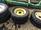 (2) 4 LUG IMPLEMENT TIRES AND RIMS - BOTH ONE PRICE