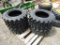 (4) NEW 12-16.5 SKID STEER TIRES - ALL ONE PRICE