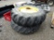 (2) 18.4/34 9 HOLE TRACTOR TIRES AND RIMS - BOTH ONE PRICE