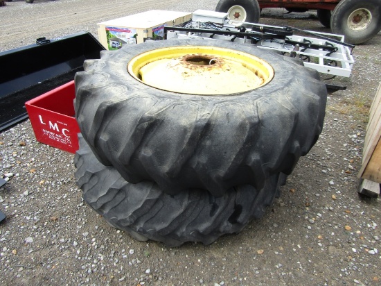 (2) 18.4/34 9 HOLE TRACTOR TIRES AND RIMS - BOTH ONE PRICE