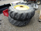 (2) 18.4/34 9 HOLE TRACTOR TIRES AND RIMS - BOTH ONE PRICE