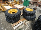 (4) NEW 10.16.5 SKID STEER TIRES ON YELLOW RIMS - ALL ONE PRICE