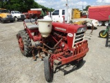 140 FARMALL TRACTOR W/ CULTIVATORS AND SIDE DRESSER