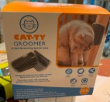 KITTY GROOMER