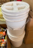 2 OF 5 GALLON PALES FULL OF UNKNOWN PRODUCT --- SAYS CEMENT ON THE TOP