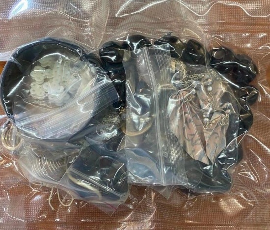 SMALL BAG OF JEWELRY