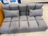KID FLOOR COUCH THAT TURNS INTO A BED