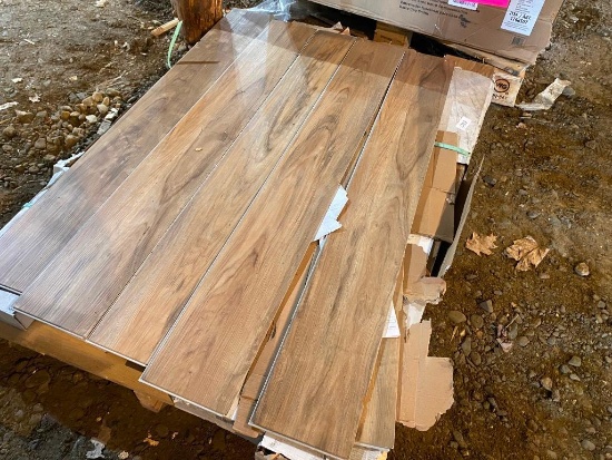 APPROX. 125 SQ FT OF VINYL PLANK FLOORING --- SOME ARE DAMAGED