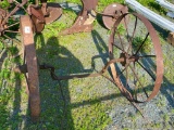 SMALLER SET OF STEEL WAGON WHEELS WITH AXLE